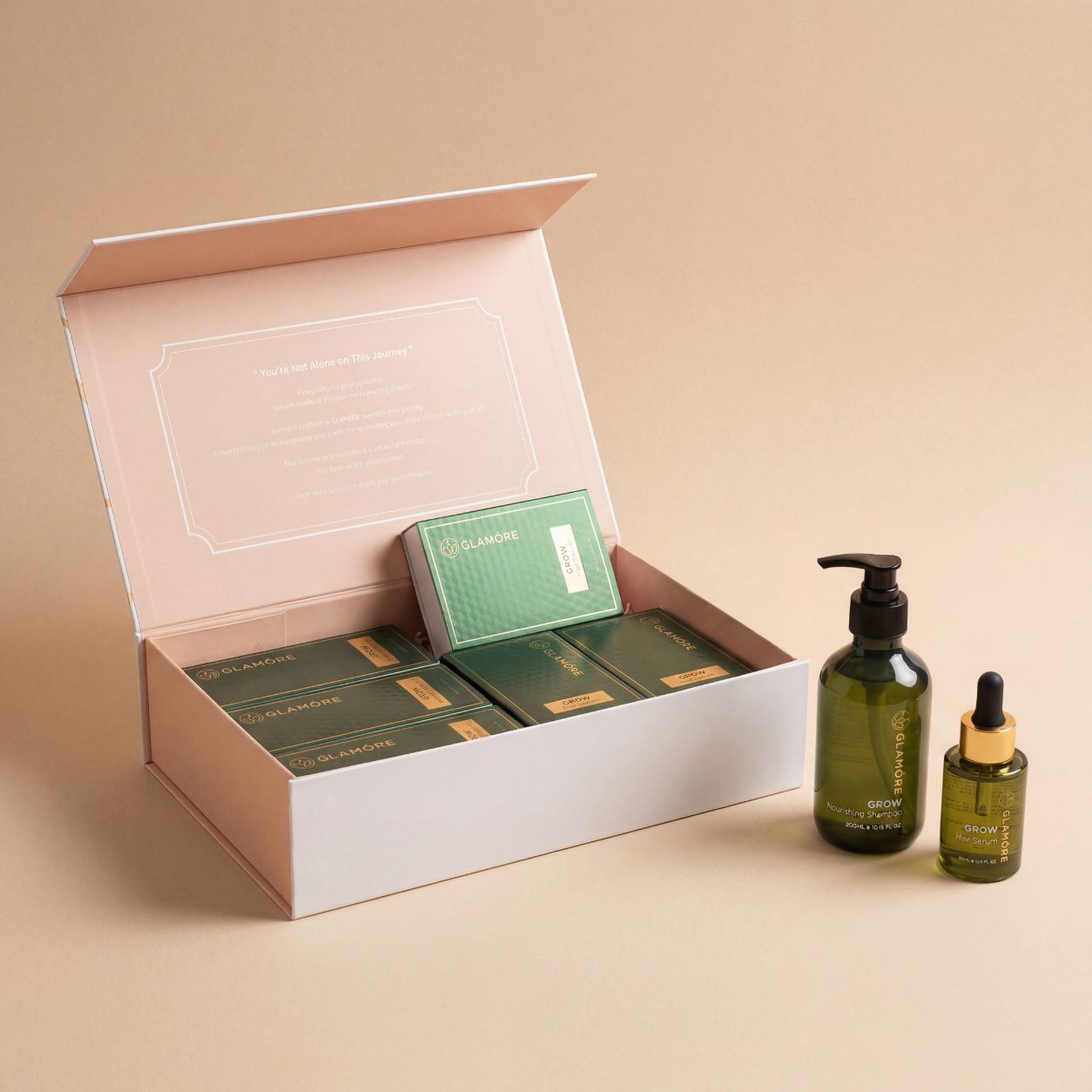 Cosmetic set with green bottles and boxes on a beige background