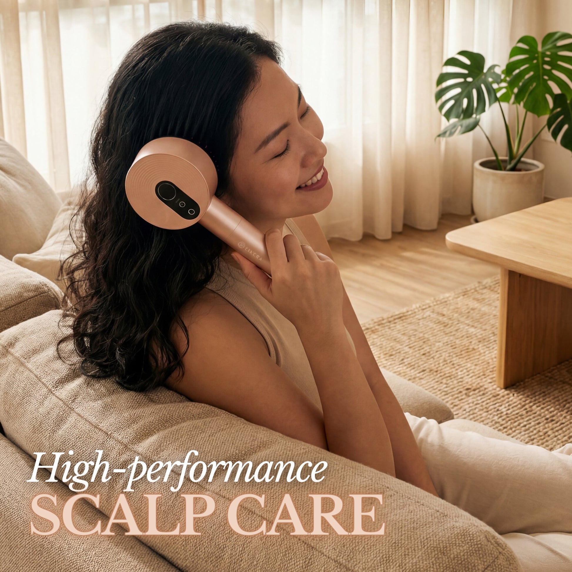 Woman using a luxera device in a cozy living room.